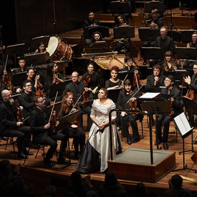 Orchestra on stage for previous performance of Eumeralla